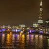 London bridges lit up along the Thames river
