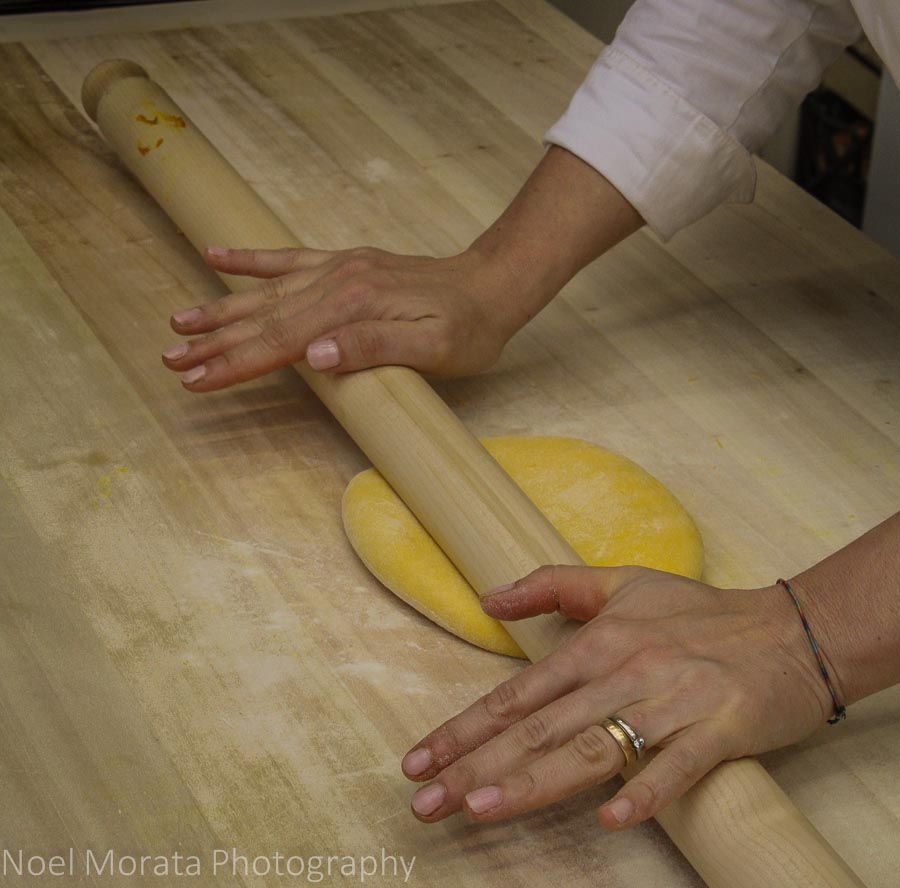 Rolling out the dough for a Bologna cooking class 