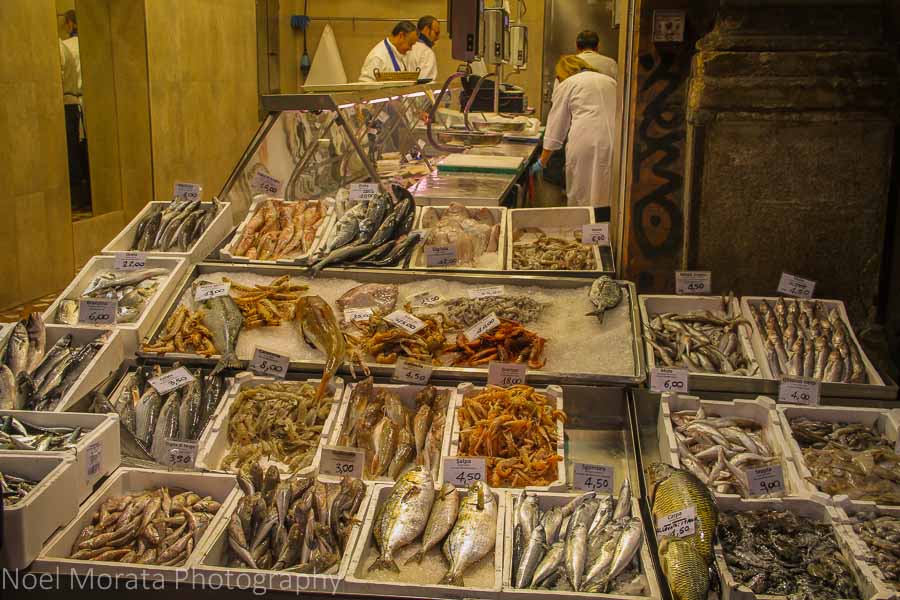 Shopping for fish after hours in the ancient market of Bologna