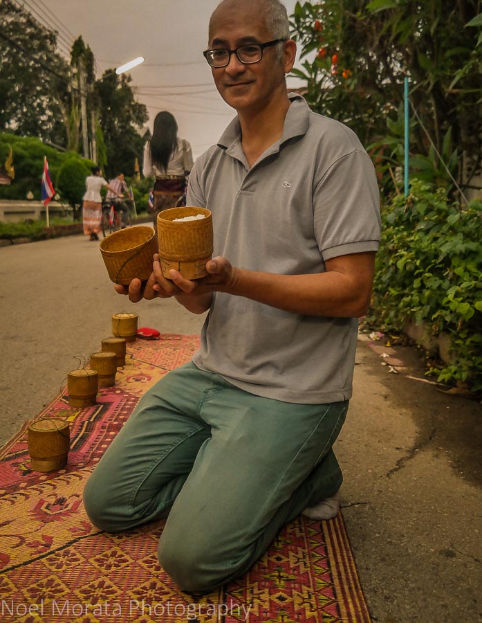 Offering alms of rice in Chiang Khan