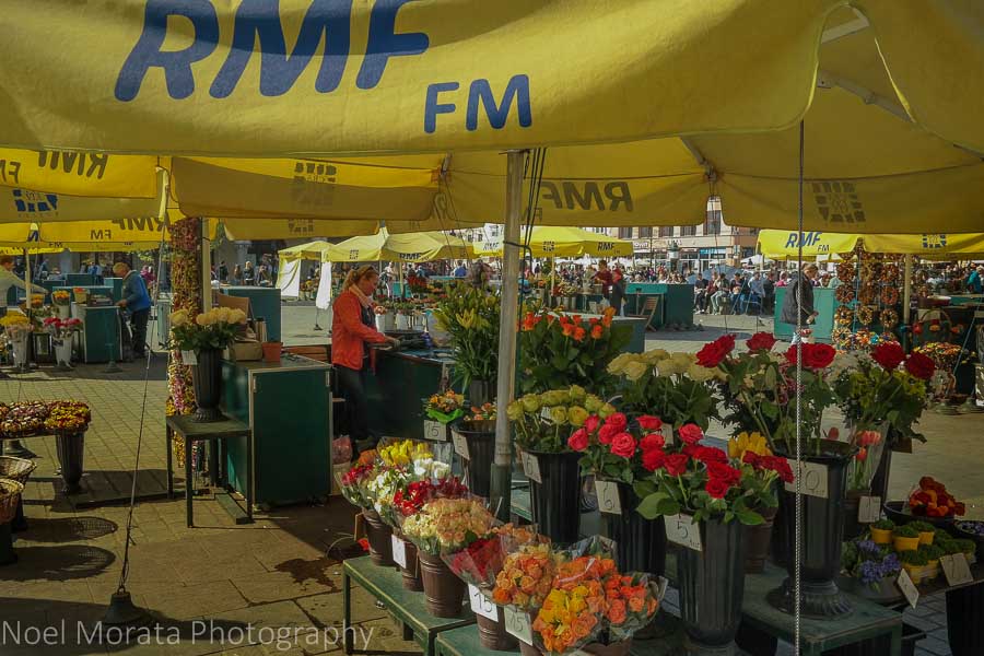 Krakow highlights in one day - flower stalls in the main square of Krakow