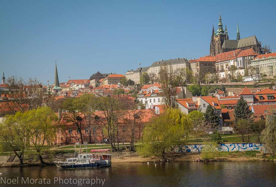 Views of Prague's New Town, castle and cathedral across the Vltava River