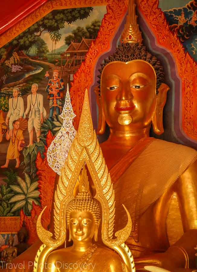 Buddhas and murals at the inner temple compound of Doi Suthep