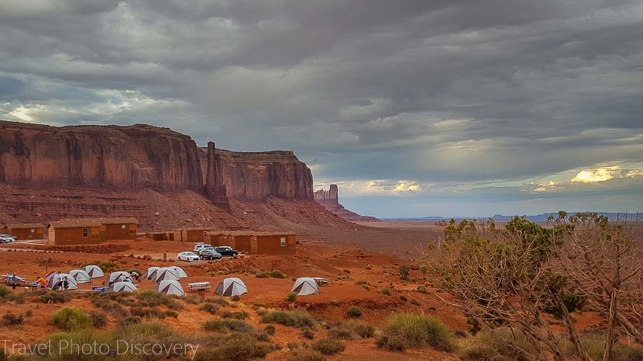 Dark clouds during Monsoon season and campsite at Monument Valley