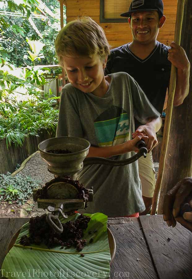 Grinding cacao nibs into cacao paste at La Loma Bastimentos