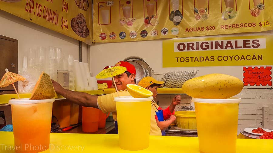 Touring Mexico City Tours by Locals visiting a local market and fruit drinks