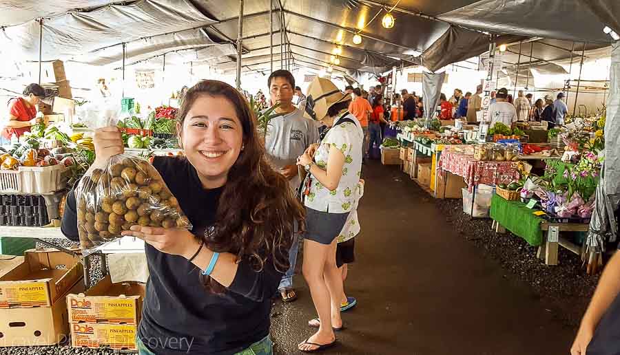 Buying tropical fruits at Hilo Farmers market