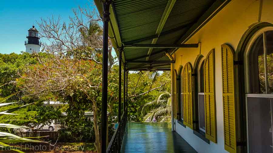 Hemingway Home in Key West, Hemingways iconic home. This is the wrap around porch on the second floor looking out to the lighthouse and gardens