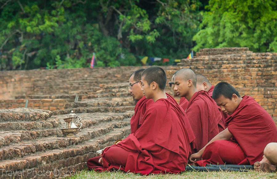 Chanting prayers fronting the temple ruins at Lumbini