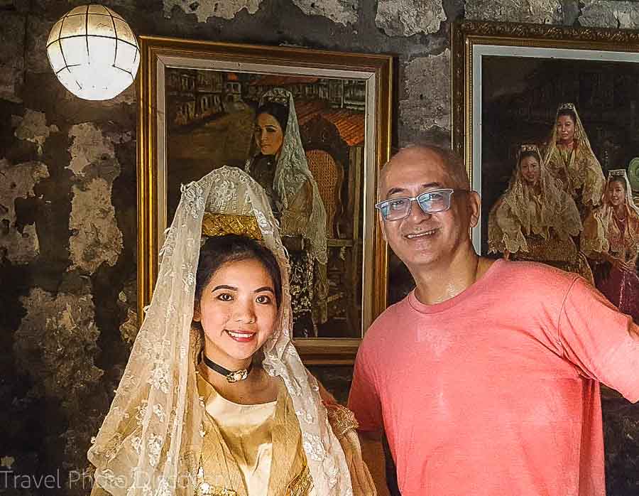 Posing with a young Filipina in costume in Cebu