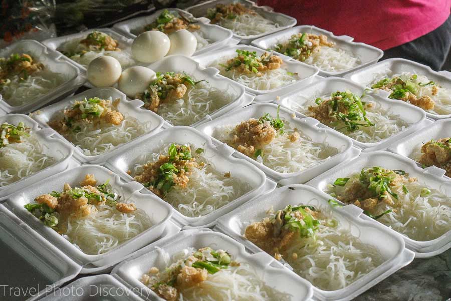 Noodle dishes for sale at Vigan market