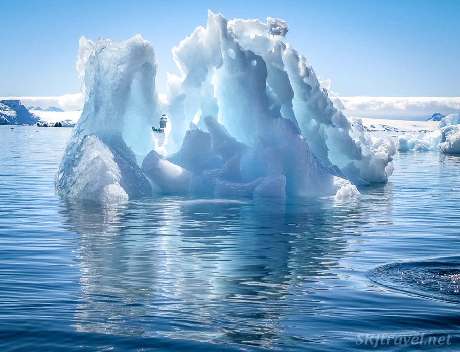 Kayaking around icebergs in Antarctica