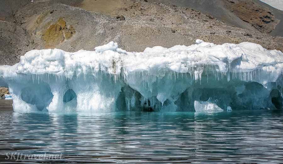 Kayaking around icebergs in Antarctica