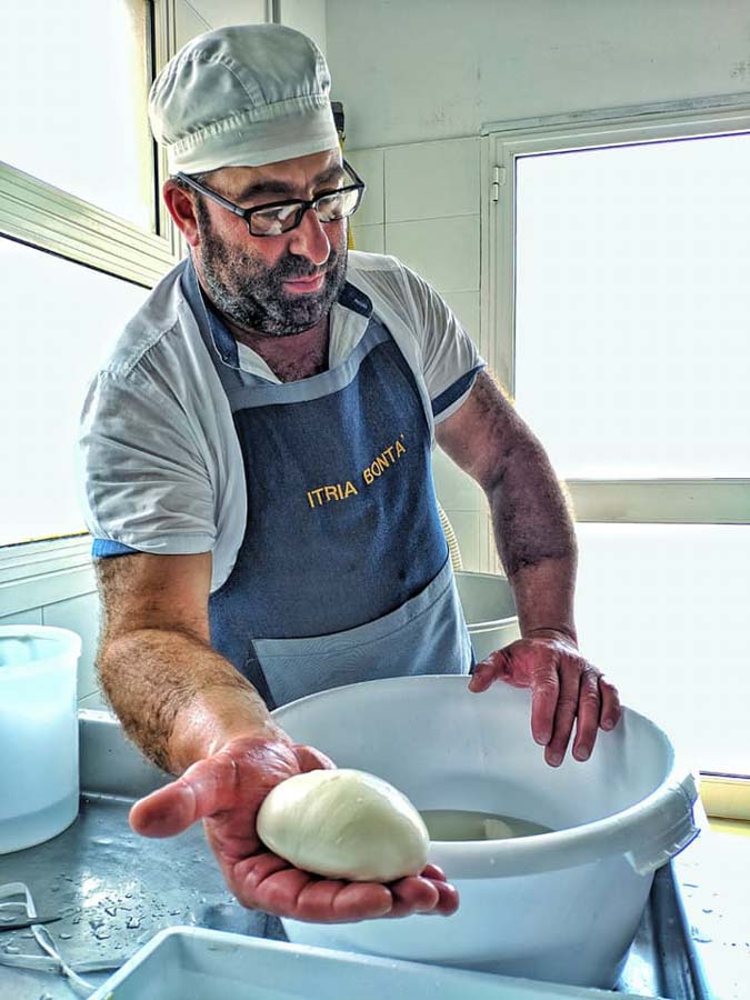 Man-making-Burrata-Puglia-Italy-Southern-Visions-Travel