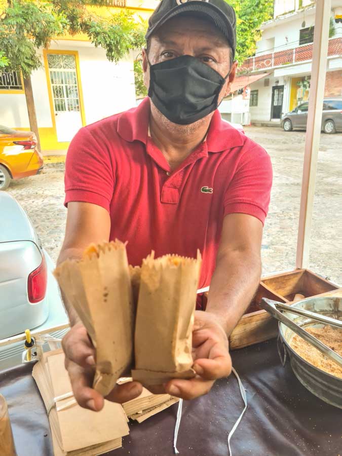 we each get our own bag of delicious churros