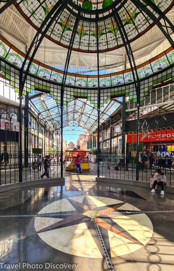 Glass atrium with shops and restaurants off 5 de Mayo