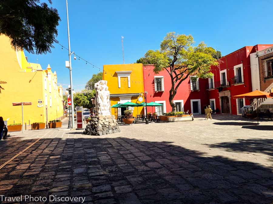 San Roque square with restaurants, fountains and places to sit and people watch in the area.