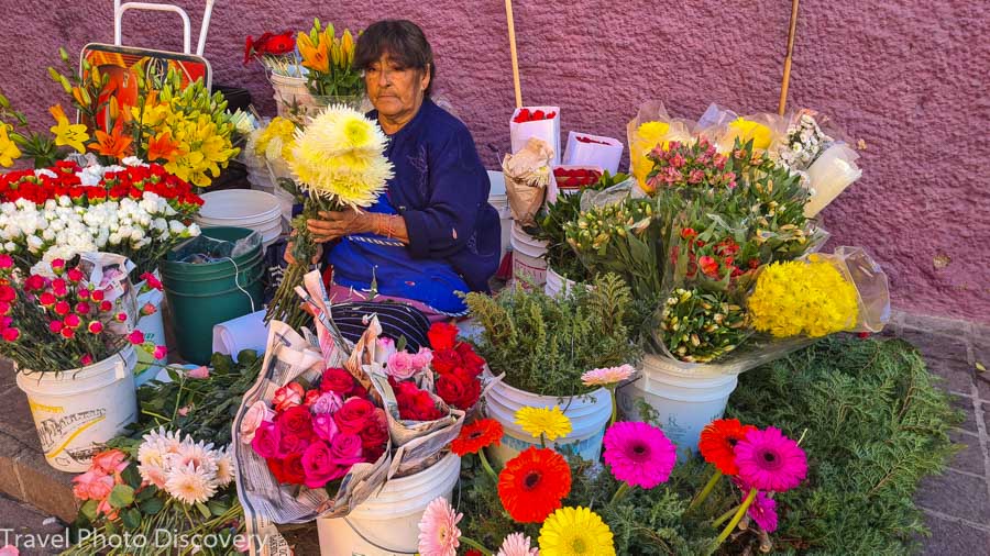 A colorful Instagram moment with a flower vendor