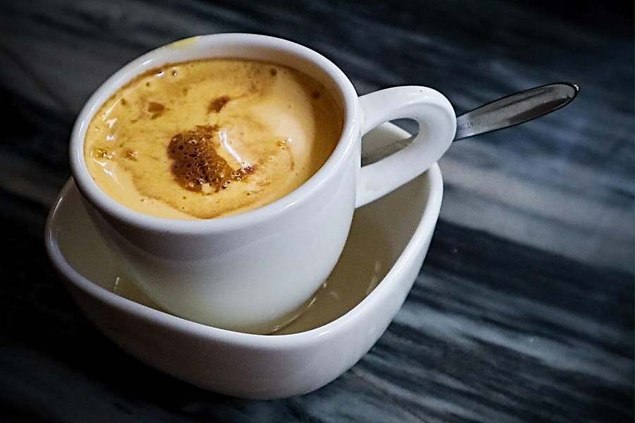 Try the famous egg coffee at Giang Cafe
