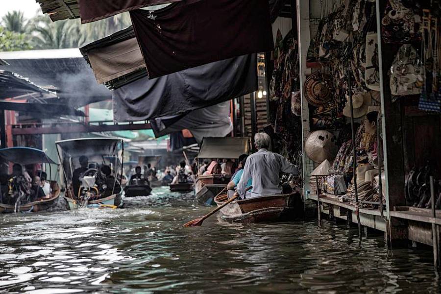 Visit the floating markets of Bangkok