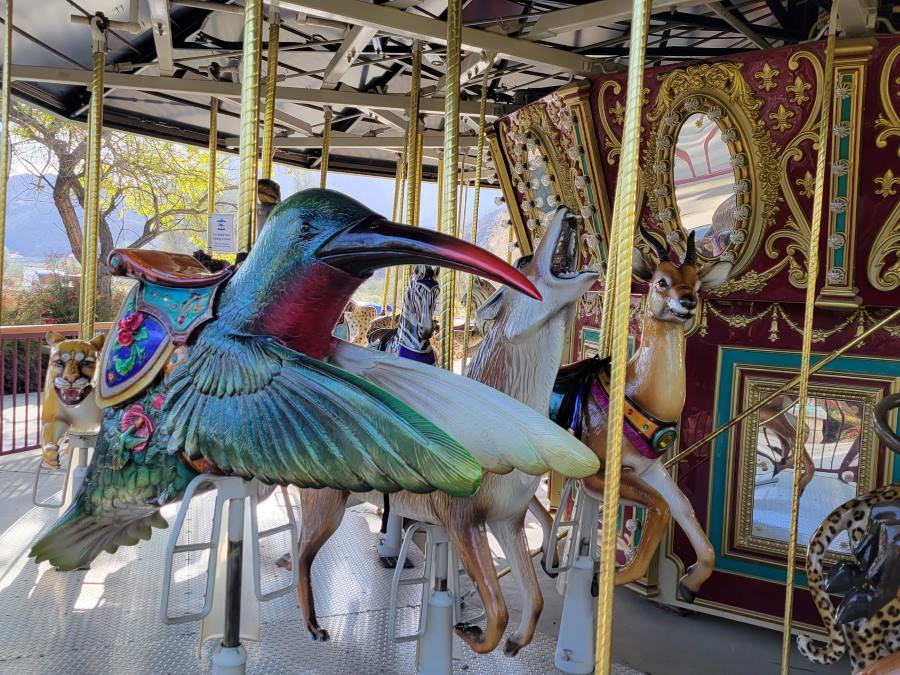 fabulous merry go round with whimsical characters